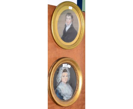 English School, portrait of a lady, pastel, indistinctly inscribed verso; together with a similar portrait of a gentleman (2)