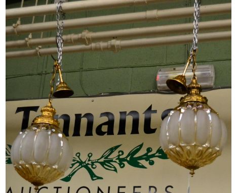 A pair of hanging light fitments 