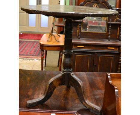 A George III Provincial oak tilt top tripod table 