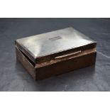 A 20th century silver cigarette box, of hinged rectangular form having engine turned decoration to