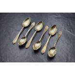 A cased set of six George V silver Hanoverian style teaspoons, having embossed decoration to the