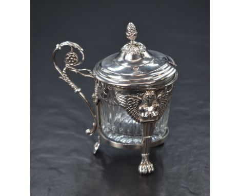 A French late 20th century 800. grade white metal mounted glass condiment pot, of circular form having an acorn finial, scrol