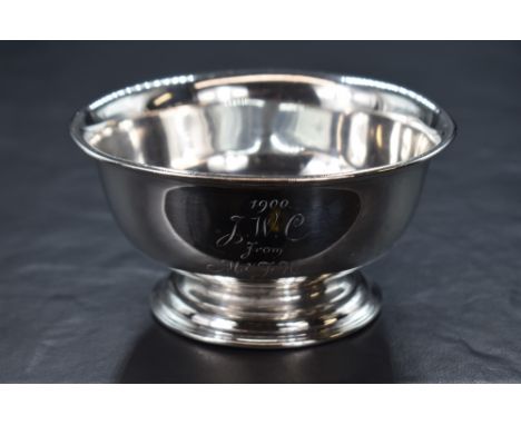 A Victorian silver pedestal bowl, of circular form having a slightly flared moulded rim, '1900 J.W.C from M &amp; F H' engrav