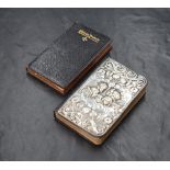 An Edwardian silver mounted Book of Common Prayer, having embossed Art Nouveau style floral