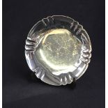 A George VI silver salver, of circular form having a lobed rim raised on a circular step moulded