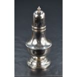 A George V silver pepperette, of of bulbous form having finial top with moulding decoration,