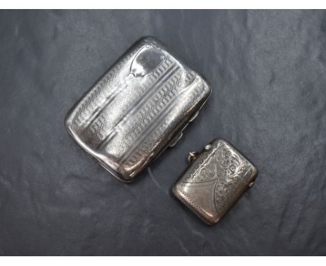 A George V silver cigarette case, of hinged rectangular form and slightly curved for the gentleman's pocket, having engine tu