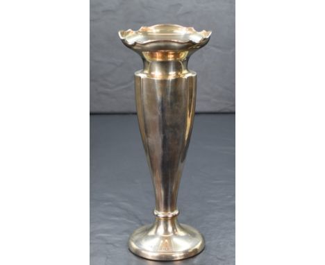 A George V silver fluted vase, having a flared Chippendale style rim and canted body, raised on a circular foot, marks for Bi