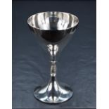 An Elizabeth II silver goblet, of traditional form raised on a knopped foliate stem and circular