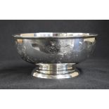 A George VI silver pedestal bowl, of traditional form having a moulded rim and decorative floral
