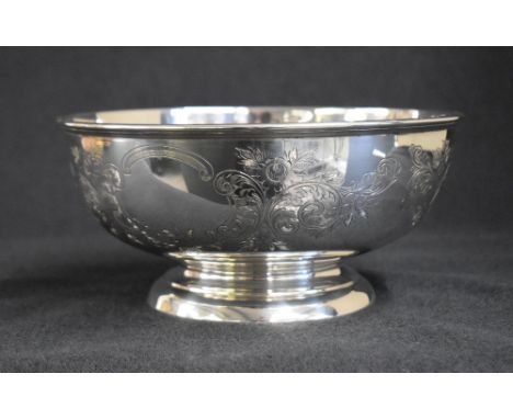 A George VI silver pedestal bowl, of traditional form having a moulded rim and decorative floral scroll engraving with two va
