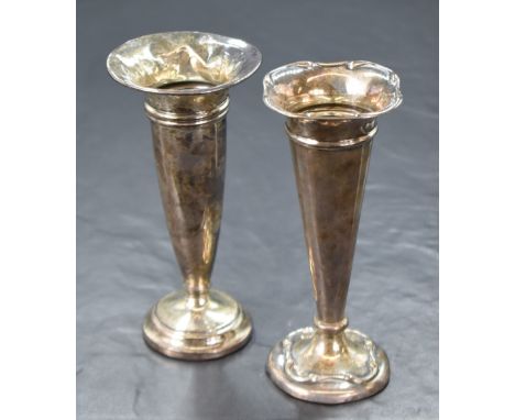 A late Edwardian Art Nouveau style silver vase, of fluted form having a quatrefoil rim with moulded decoration, raised on a c