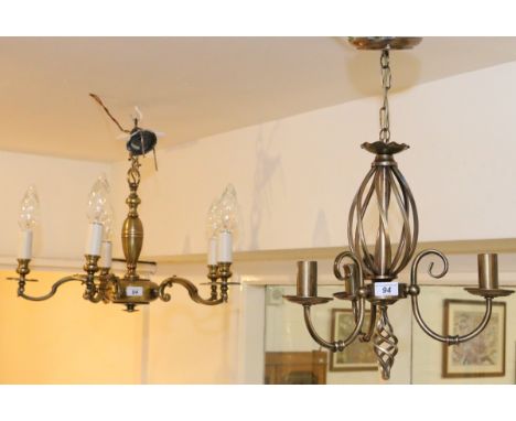 A heavy five branch ceiling light fitting along with a similar three branch fitting and nine candle style bulbs.