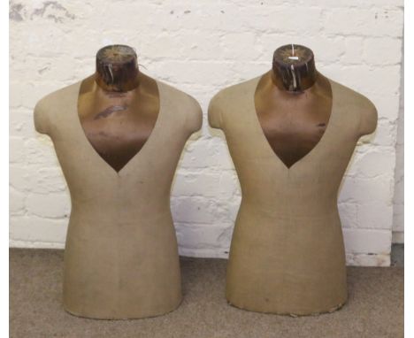 A pair of vintage cloth and silk mounted shop mannequins.
