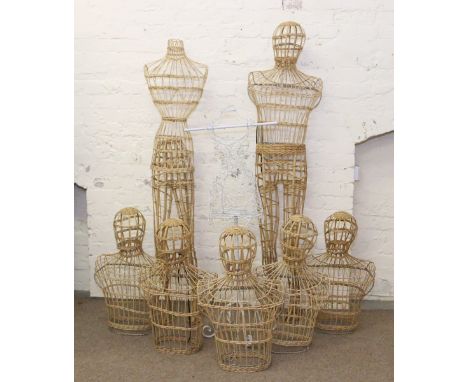 Two wicker work mannequins, five similar torsos and a wirework mannequin.