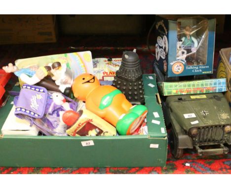 A box of childrens toys and games to include Wallace & Gromit talking alarm clock, Jelly Babies money box, Dalek model, etc.