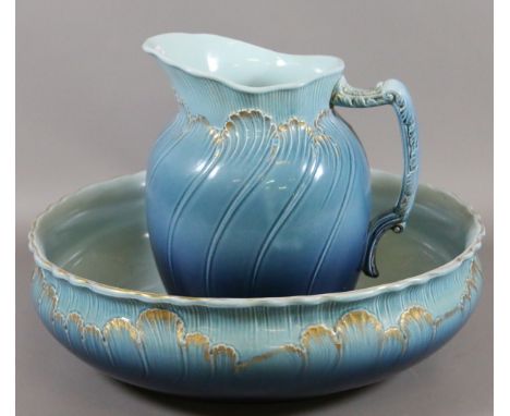 A Villeroy & Boch vintage jug and bowl set decorated with gilt.