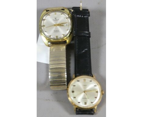 A gentleman's vintage Timex manual wristwatch and a Worcester automatic manual bracelet watch with date and day displays.