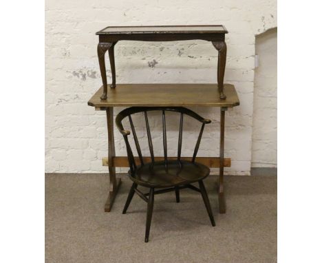 A small pine refectory kitchen table, a mahogany coffee table raised on carved cabriole legs and an Ercol spindleback armchai