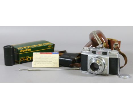 An Agfa super silette 35mm film camera in case along with a Sekonic light meter, a Weston potometer light meter in original b