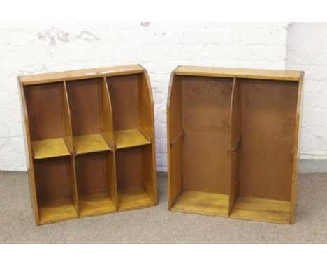 A pair of vintage pine shop display racks.