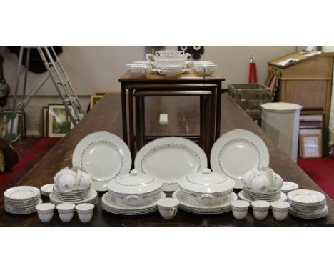 A Royal Worcester tea and dinner service decorated in the silver chantilly design approximately one hundred and forty pieces.