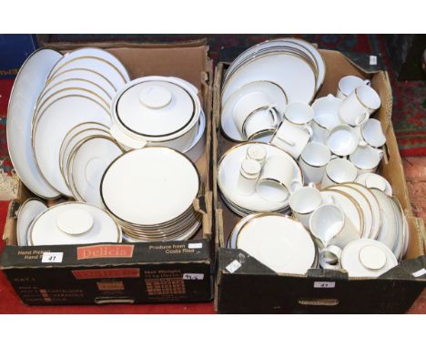 Two boxes of white ceramic dinner and tea wares decorated with a gilt border by Thomas made in Germany approximately eighty p