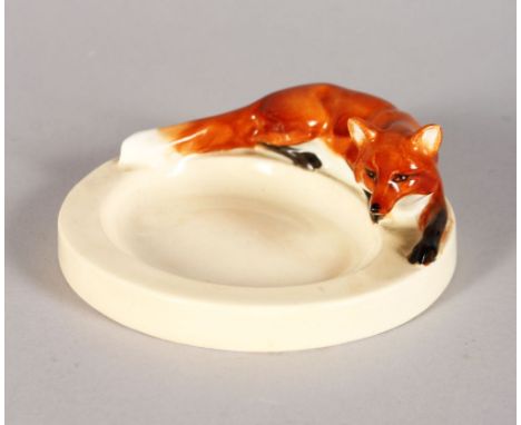 A ROYAL WORCESTER FOX ASHTRAY, modelled by DORIS LINDNER, Pattern No: 2873 4in high