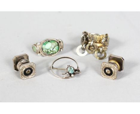 THREE SCOTTISH SILVER RINGS, and a pair of cufflinks