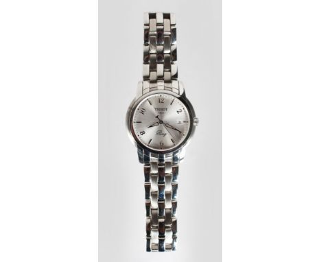A TISSOT STAINLESS WRIST WATCH, with bracelet strap