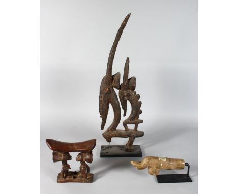 TWO AFRICAN CARVED WOOD TRIBAL ITEMS, an antelope group and a neck rest, together with an early Indian stone pipe (3)