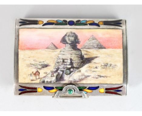 A SILVER AND ENAMEL EGYPTIAN STYLE SNUFF BOX, the lid with a sphinx 2.75in long