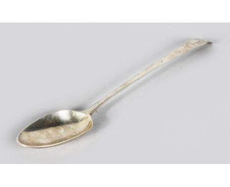 AN IRISH SILVER BASTING SPOON, Dublin 1786, Maker: J.P., with bright cut decoration and engraved armorial. 12ins long.