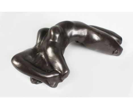 AFTER AUGUSTE RODIN (1840-1917) FRENCH AN ABSTRACT, RECLINING FEMALE NUDE, signed A. RODIN, with foundry stamp. 1ft 3ins long