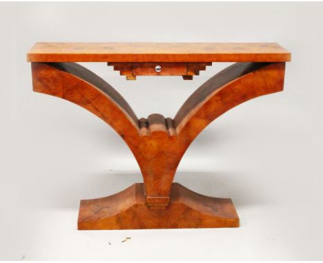 AN ART DECO STYLE BURR WOOD CONSOLE TABLE, with a rectangular top, a small drawer on curving support with platform base. 4ft 