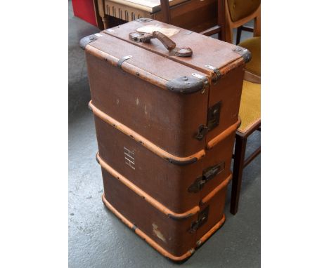 A vintage trunk with travel stickers initialled H.H on the top  33 x 49 x 78cm