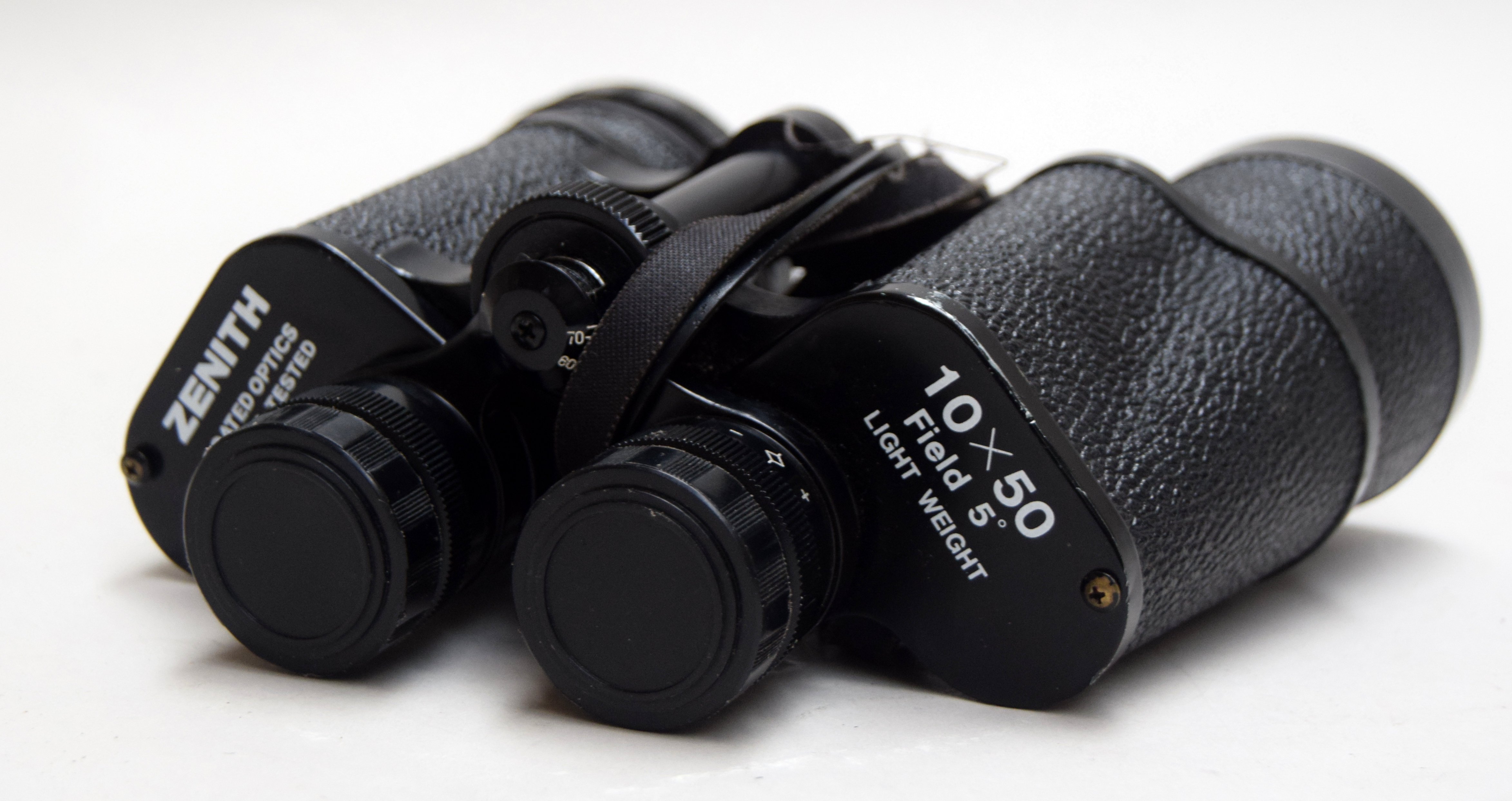 A pair of Zenith 10 x 50 triple tested light weight binoculars in case