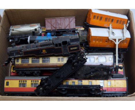 A collection of Hornby model railway parts, including three 15210 composite coaches, a 34100 brake coach, two Hornby R016 060