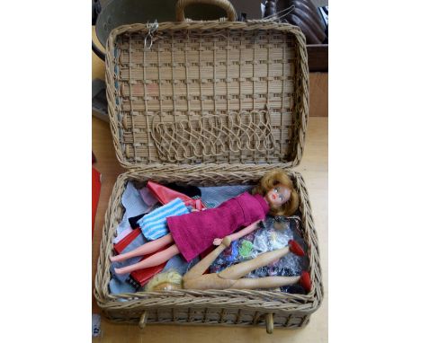 A vintage Palitoy Tressy plastic doll and a selection of Tressy clothing and accessories, together with a vintage wooden doll