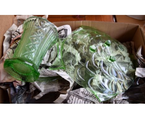 A small collection of green glass, including a green glass serving tray and cut glass vase, together with a green ceramic glu