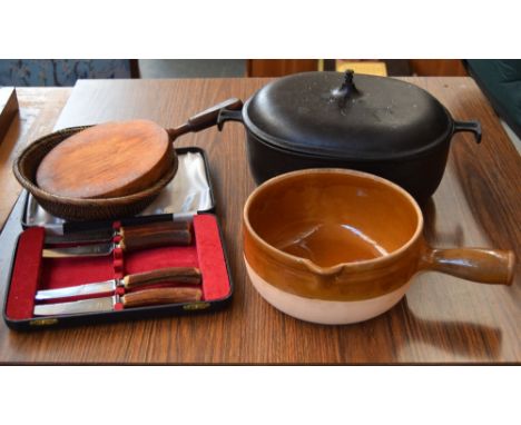 A mixed lot, to include a set of wooden knives, a stoneware stick handle bowl, a metal pot and a wooden basket