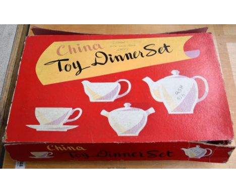 A vintage boxed Japanese made children's tea set, together with another set