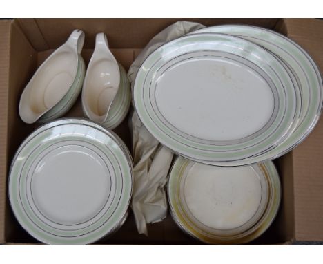 A mixed lot of ceramics, to include a set of twelve 1940s dinner plates with green borders together with three matching turee
