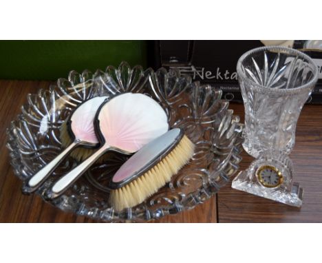 A mixed lot to include a ladies' three piece vanity set, a cut glass bowl and a small cut glass mantle clock, both Waterford 