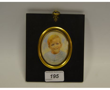 English School (early 20th century), a portrait miniature, of a young boy, signed with initials CHJ, watercolour on ivory