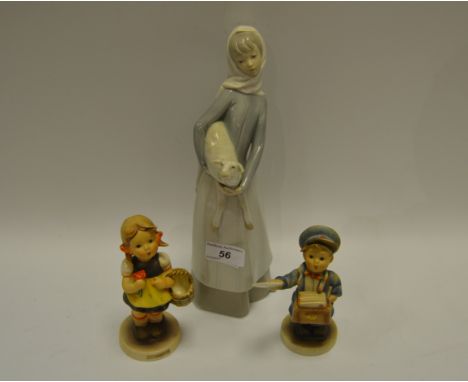A Lladro figure of a young lady holding a lamb (faults); a Hummel figure, 'Sister'; another of a paperboy