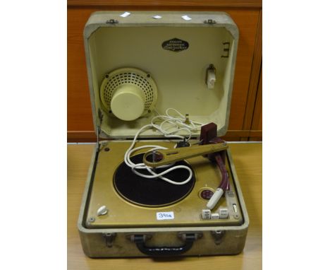 A Philip Auto sonic disc jockey portable record player, 33,45,78 speed, white case, built in speaker
