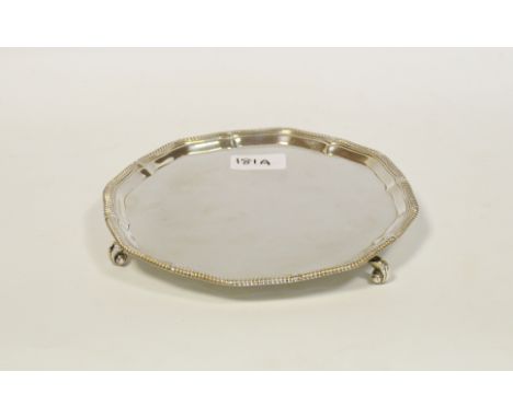 A silver salver, beaded rim, tripod scrolled feet, 20.5cm diam, Roberts & Belk, Sheffield 1978,  10.5oz