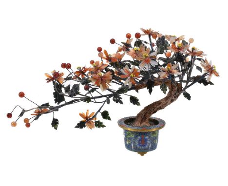 A Chinese agate and hardstone tree, 20th century, supported in a cloisonné enamel circular jardinière on three feet, overall 