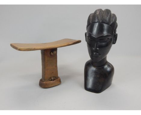 Tribal Art.  A carved African head rest with woven hide handle and a hardwood bust carved in the form of a male figure (2)